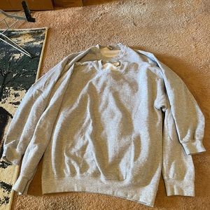 Two plain gray crewneck